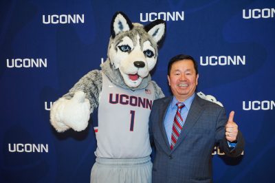 Jonathan the Husky and Provost Mun Choi at the 2015 UConn Spirit awards event held at the Student Union Ballroom on March 4, 2015. (Peter Morenus/UConn Photo)